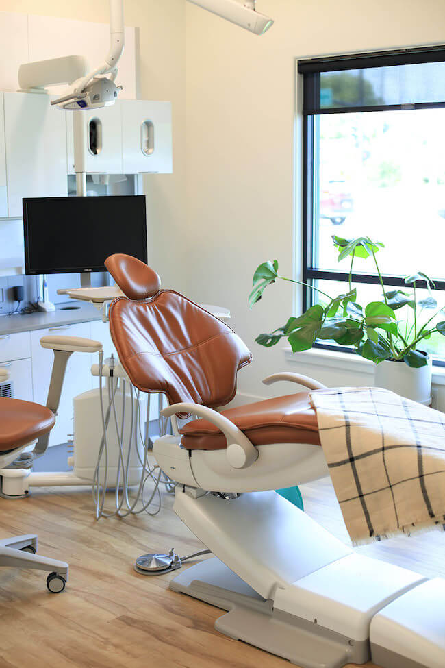 Our team focuses on how your smile impacts your overall wellness Our dentist chair in one of the treatment rooms