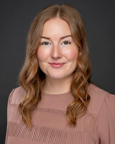 Headshot of Kinli, our Regional Manager